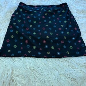 Greg Norman women’s golf skort size Small black floral pockets athleisure